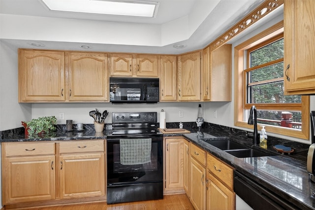 441 Kimmes Ln, Breckenridge, CO 80424 - kitchen with black appliances, a sink, dark stone countertops, light brown cabinets, and light wood-style flooring