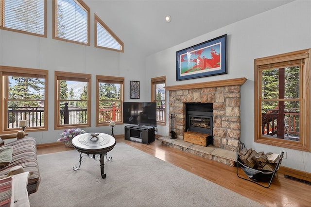 441 Kimmes Ln, Breckenridge, CO 80424 - living area featuring high vaulted ceiling, wood finished floors, and baseboards