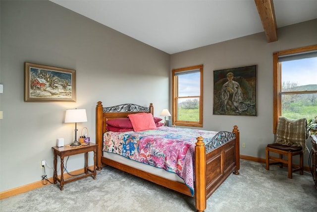 43855 Old Elk Trl, Steamboat Springs, CO 80487 - bedroom with carpet, baseboards, and beam ceiling