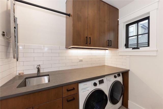 300 E Washington Ave, Breckenridge, CO 80424 - washroom featuring washing machine and clothes dryer and cabinet space