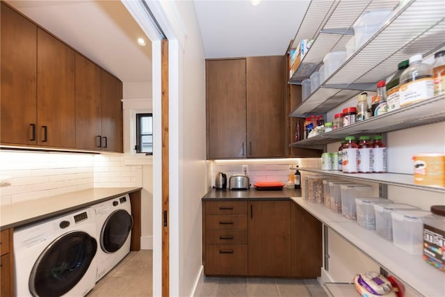300 E Washington Ave, Breckenridge, CO 80424 - washroom with washer and clothes dryer, light tile patterned floors, cabinet space, and recessed lighting