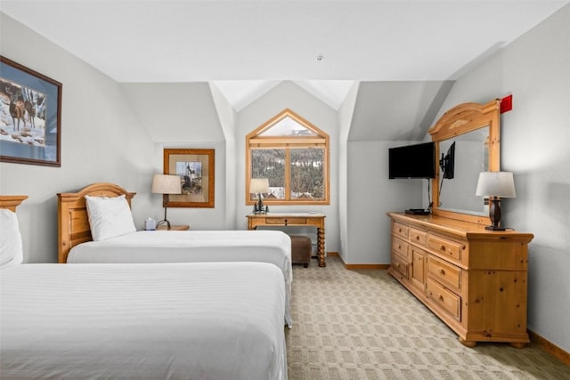 23110 US Highway 6 Unit 5044, Keystone, CO 80435 - bedroom with vaulted ceiling, baseboards, and light colored carpet