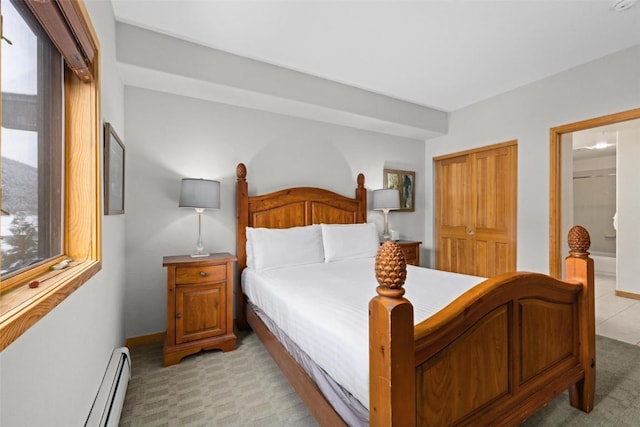 23110 US Highway 6 Unit 5044, Keystone, CO 80435 - bedroom with a baseboard radiator, baseboards, and carpet