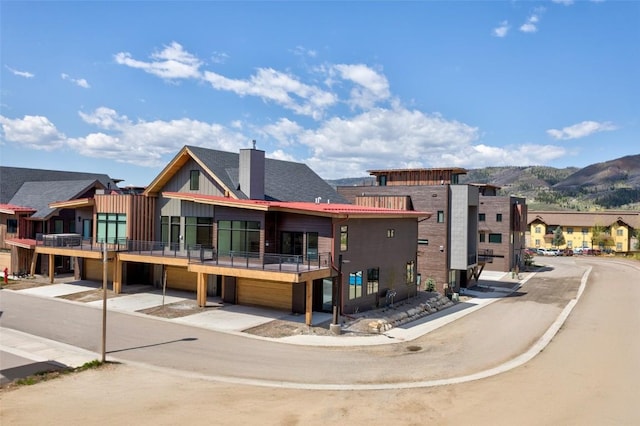 exterior space featuring a mountain view