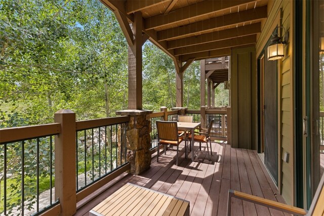 34 Highfield Trl Unit 203, Breckenridge, CO 80424 - wooden terrace with outdoor dining area