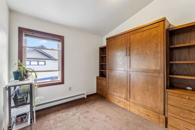 245 Tennis Ct, Silverthorne, CO 80498 - unfurnished bedroom with a baseboard heating unit, light carpet, and lofted ceiling