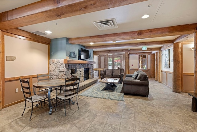 150 Dercum Sq Unit 8499, Keystone, CO 80435 - dining space featuring beamed ceiling, a fireplace, recessed lighting, and stone finish flooring