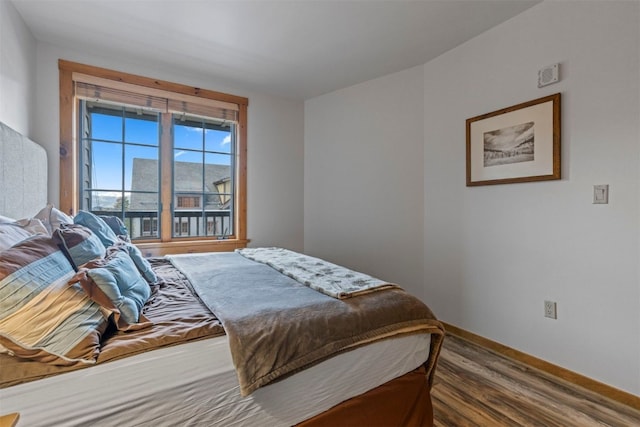 150 Dercum Sq Unit 8499, Keystone, CO 80435 - bedroom featuring wood finished floors and baseboards