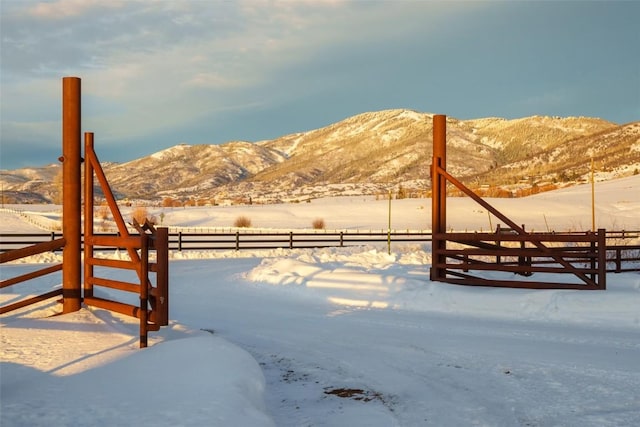 32505 County Road 20, Steamboat Springs, CO 80487 - yard layered in snow with a mountain view
