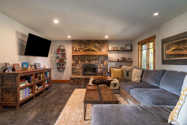 32505 County Road 20, Steamboat Springs, CO 80487 - living room featuring recessed lighting, a stone fireplace, and baseboards