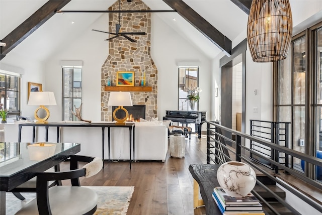 257 Barton Ridge Dr, Breckenridge, CO 80424 - living room featuring beam ceiling, hardwood / wood-style flooring, high vaulted ceiling, a ceiling fan, and a chandelier
