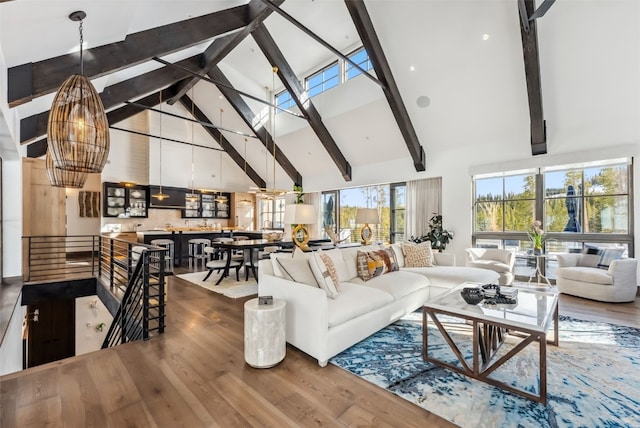 257 Barton Ridge Dr, Breckenridge, CO 80424 - living area with wood finished floors, high vaulted ceiling, and beamed ceiling