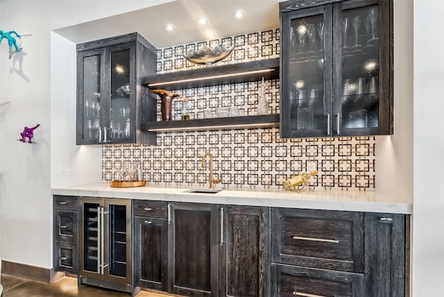257 Barton Ridge Dr, Breckenridge, CO 80424 - indoor wet bar with wine cooler, decorative backsplash, and recessed lighting