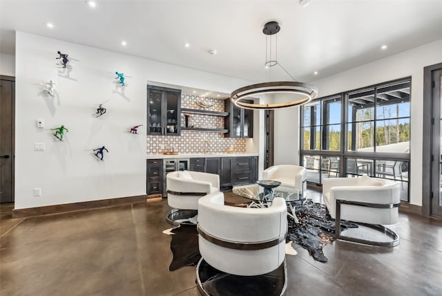 257 Barton Ridge Dr, Breckenridge, CO 80424 - dining room with finished concrete flooring, recessed lighting, and bar