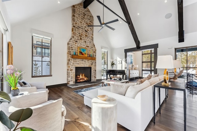 257 Barton Ridge Dr, Breckenridge, CO 80424 - living room featuring high vaulted ceiling, a stone fireplace, beam ceiling, wood finished floors, and ceiling fan