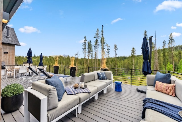 257 Barton Ridge Dr, Breckenridge, CO 80424 - wooden terrace featuring an outdoor hangout area, a forest view, and outdoor dining space