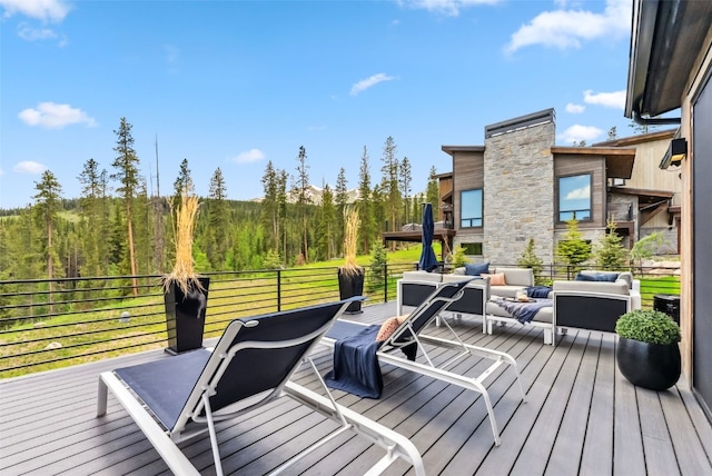 257 Barton Ridge Dr, Breckenridge, CO 80424 - wooden deck with an outdoor hangout area