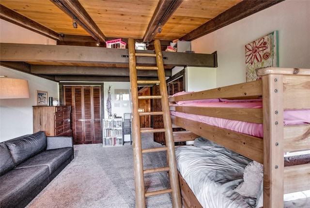 51 Salt Lick Cir Unit 51, Silverthorne, CO 80498 - bedroom featuring carpet and a wood ceiling with exposed beams