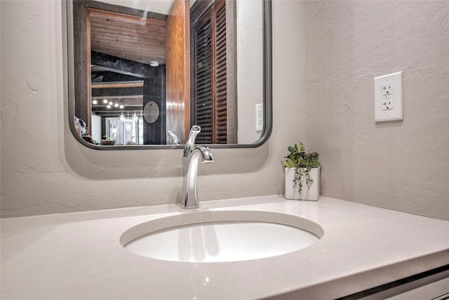 51 Salt Lick Cir Unit 51, Silverthorne, CO 80498 - bathroom view of vanity and a textured wall