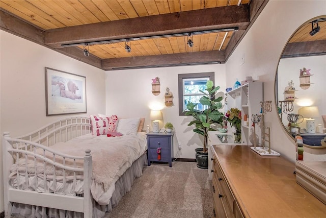 51 Salt Lick Cir Unit 51, Silverthorne, CO 80498 - bedroom featuring a wood ceiling with exposed beams, light colored carpet, and rail lighting
