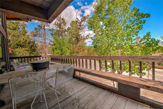51 Salt Lick Cir Unit 51, Silverthorne, CO 80498 - wooden deck with outdoor dining area