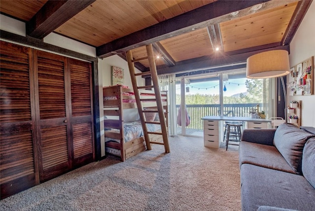 51 Salt Lick Cir Unit 51, Silverthorne, CO 80498 - carpeted bedroom featuring a wooden ceiling with exposed beams, access to exterior, and a closet