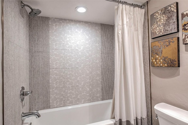 51 Salt Lick Cir Unit 51, Silverthorne, CO 80498 - bathroom with shower / bath combo with shower curtain and toilet