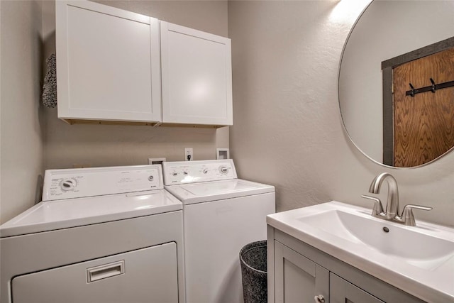 51 Salt Lick Cir Unit 51, Silverthorne, CO 80498 - washroom with cabinet space, washing machine and dryer, and a textured wall