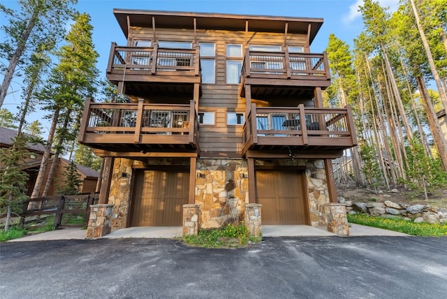 564 White Cloud Dr, Breckenridge, CO 80424 - view of front facade with a balcony and stone siding