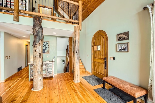 133 Lake Dr, Florissant, CO 80816 - foyer featuring visible vents, recessed lighting, stairs, hardwood / wood-style floors, and high vaulted ceiling