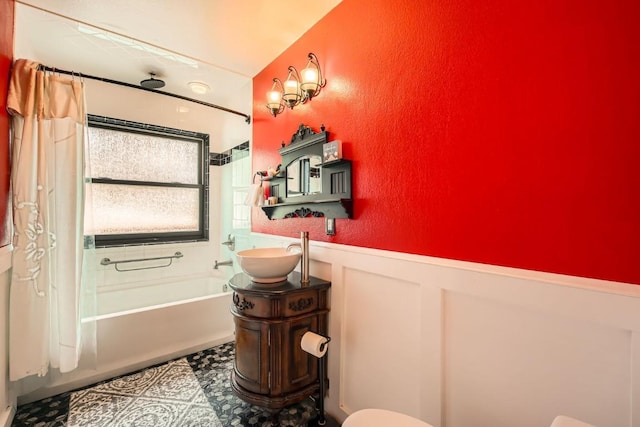 133 Lake Dr, Florissant, CO 80816 - full bath featuring shower / bathing tub combination, a textured wall, a wainscoted wall, and vanity