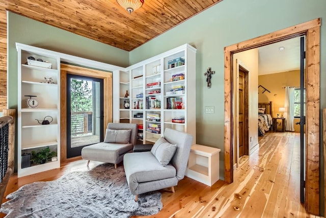 133 Lake Dr, Florissant, CO 80816 - sitting room with wooden ceiling and light wood-style floors