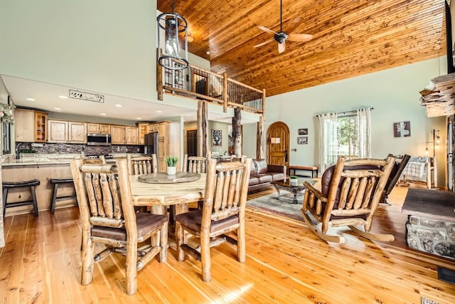 133 Lake Dr, Florissant, CO 80816 - dining area featuring recessed lighting, light wood-style floors, wood ceiling, high vaulted ceiling, and ceiling fan