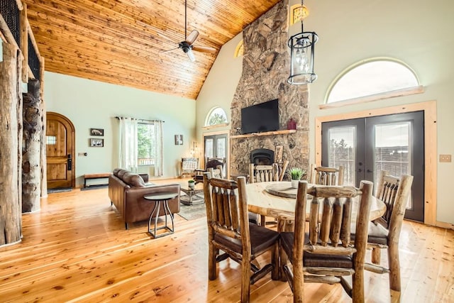 133 Lake Dr, Florissant, CO 80816 - dining space featuring light wood-type flooring, high vaulted ceiling, ceiling fan, and french doors