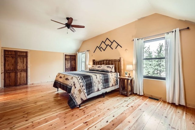 133 Lake Dr, Florissant, CO 80816 - bedroom with light wood-style floors, lofted ceiling, and a ceiling fan