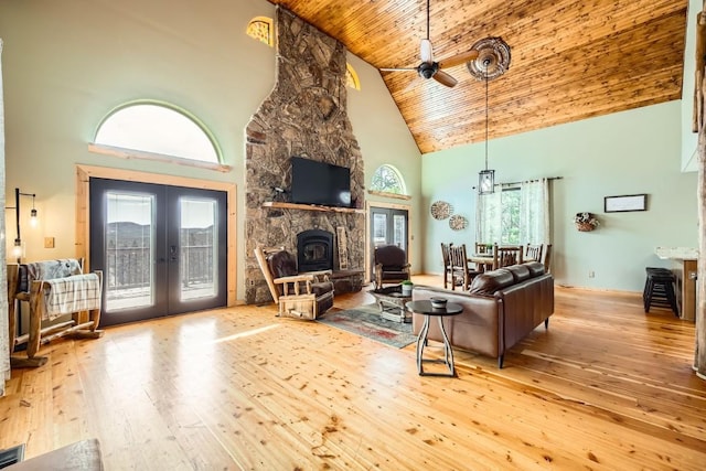133 Lake Dr, Florissant, CO 80816 - living room featuring french doors, ceiling fan, wood ceiling, hardwood / wood-style flooring, and high vaulted ceiling