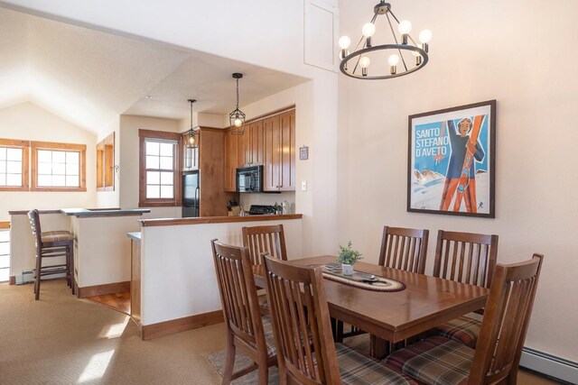 dining area with a baseboard heating unit, light colored carpet, lofted ceiling, and a chandelier