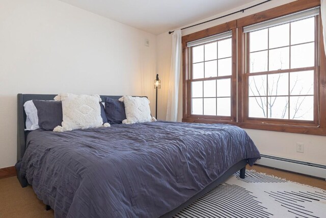 bedroom featuring a baseboard radiator