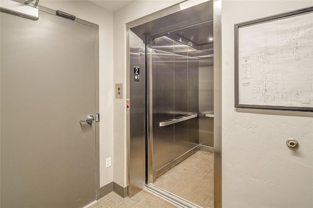 75 W 4th St Unit 204W, Silverthorne, CO 80498 - bathroom featuring elevator and baseboards