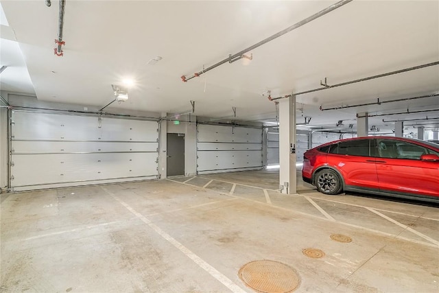 75 W 4th St Unit 204W, Silverthorne, CO 80498 - parking garage featuring a garage door opener