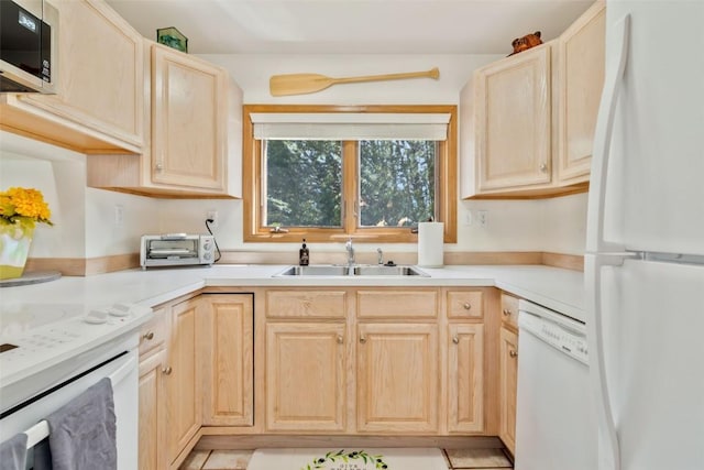 480 Ore House Plz Unit 106, Steamboat Springs, CO 80487 - kitchen with white appliances, a sink, and light brown cabinets
