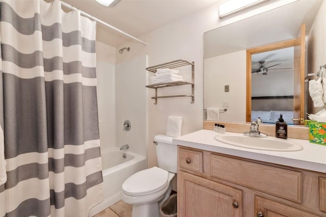 480 Ore House Plz Unit 106, Steamboat Springs, CO 80487 - full bathroom with vanity, shower / bath combo with shower curtain, toilet, ceiling fan, and tile patterned floors