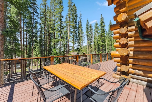 665 Whispering Pines Ln, Breckenridge, CO 80424 - wooden terrace featuring outdoor dining space