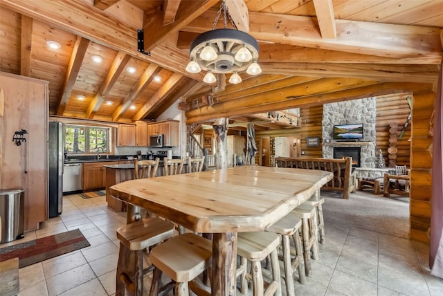 665 Whispering Pines Ln, Breckenridge, CO 80424 - dining space with wood ceiling, light tile patterned floors, rustic walls, and recessed lighting