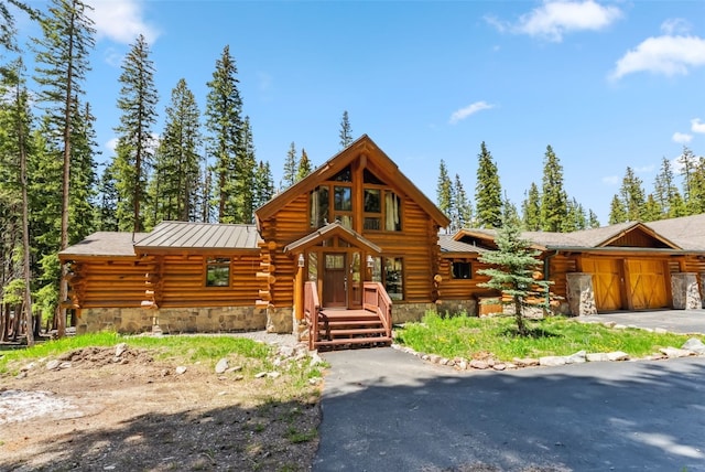 665 Whispering Pines Ln, Breckenridge, CO 80424 - log home with log exterior and stone siding