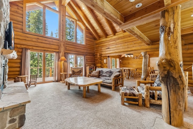 665 Whispering Pines Ln, Breckenridge, CO 80424 - living area with high vaulted ceiling, carpet, rustic walls, and a wood ceiling with exposed beams