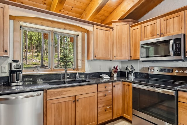 665 Whispering Pines Ln, Breckenridge, CO 80424 - kitchen featuring appliances with stainless steel finishes and dark stone countertops