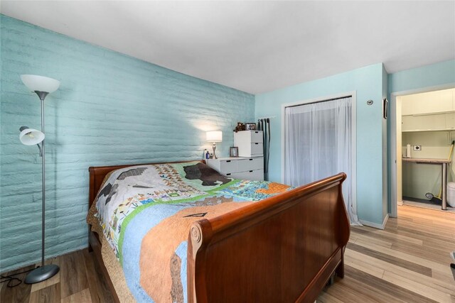 21 Balsam Ct, Steamboat Springs, CO 80487 - bedroom featuring baseboards and wood finished floors