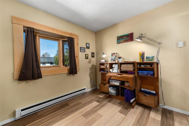21 Balsam Ct, Steamboat Springs, CO 80487 - office with baseboard heating, baseboards, and wood finished floors