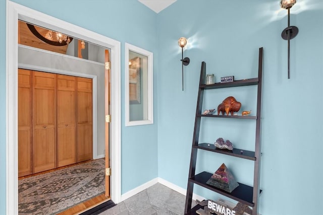 1750 Fish Creek Falls Rd, Steamboat Springs, CO 80487 - foyer entrance featuring baseboards and stone finish flooring